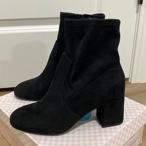 women’s black heeled chunky boots